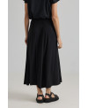 BLACK ELASTIC SKIRT WITH IRREGULAR SEAMS